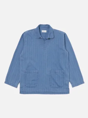 Universal Works Smock Overshirt in Washed Indigo Herringbone Denim