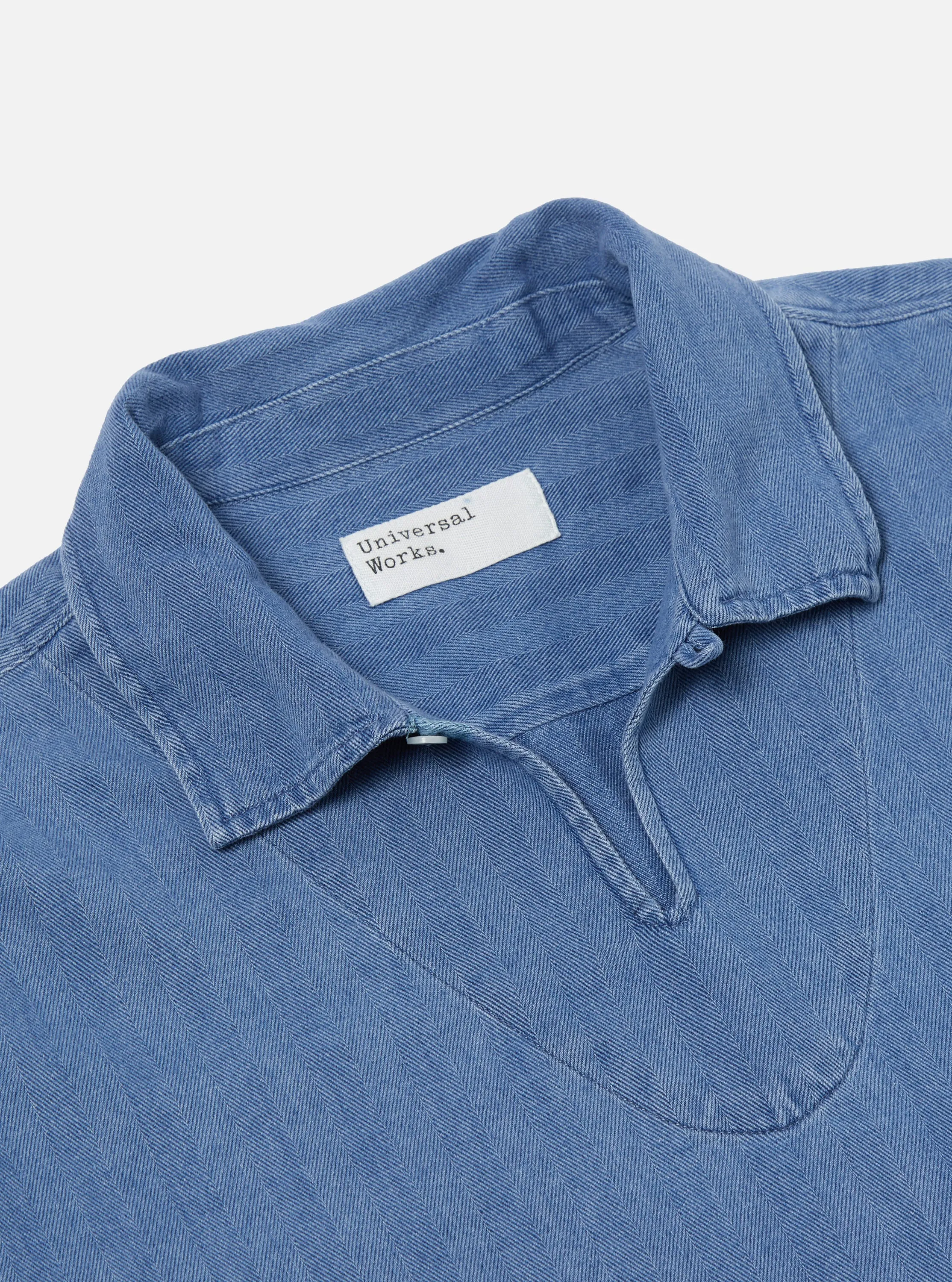 Universal Works Smock Overshirt in Washed Indigo Herringbone Denim